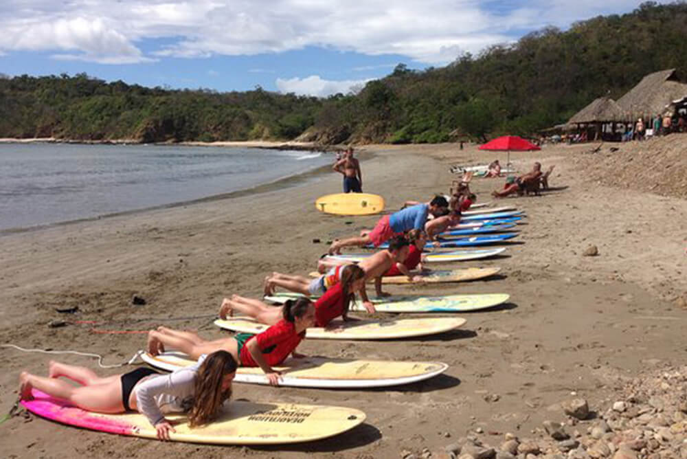 Humanitarian trip service surf lessons